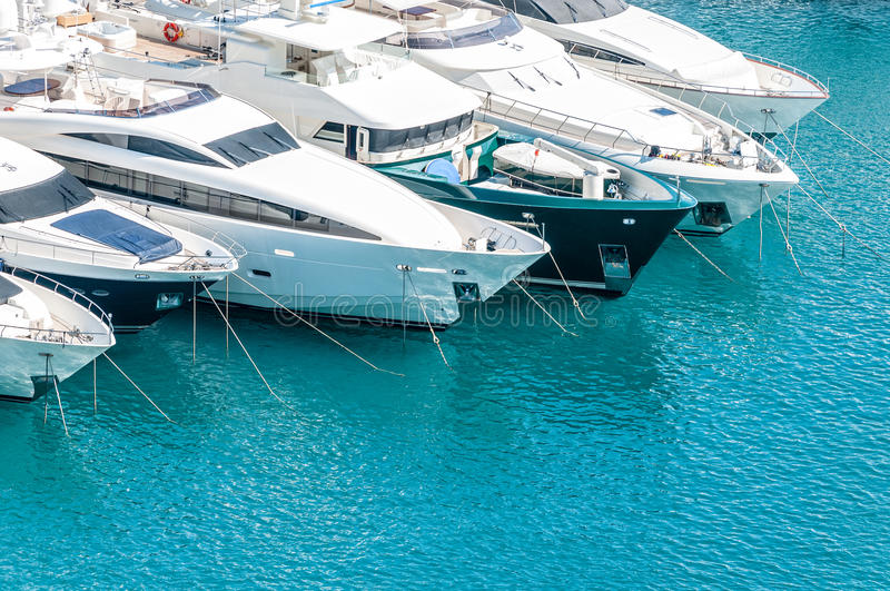 luxury yachts parked next to each other, boat hurricane